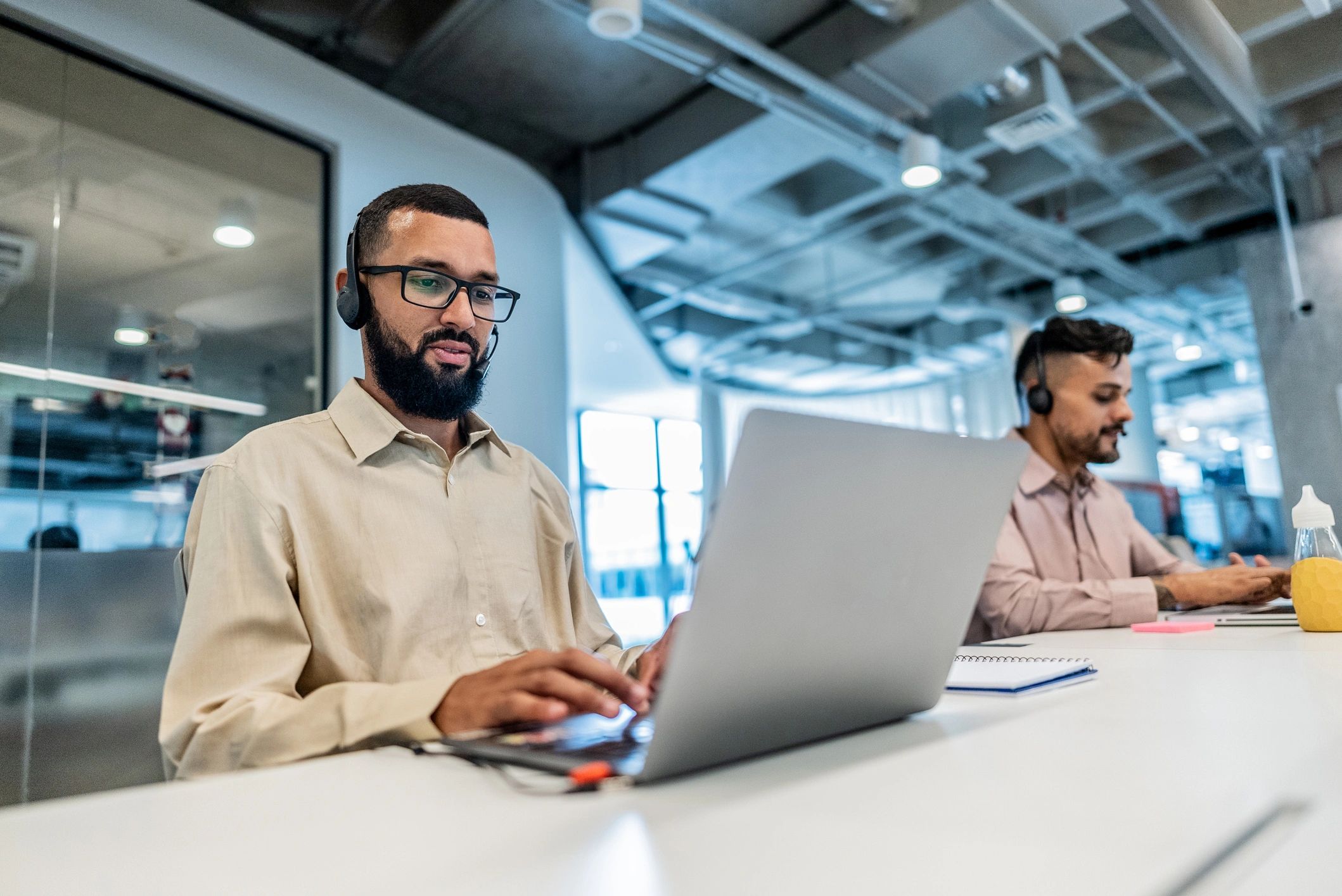 IT professional working at a computer in an office