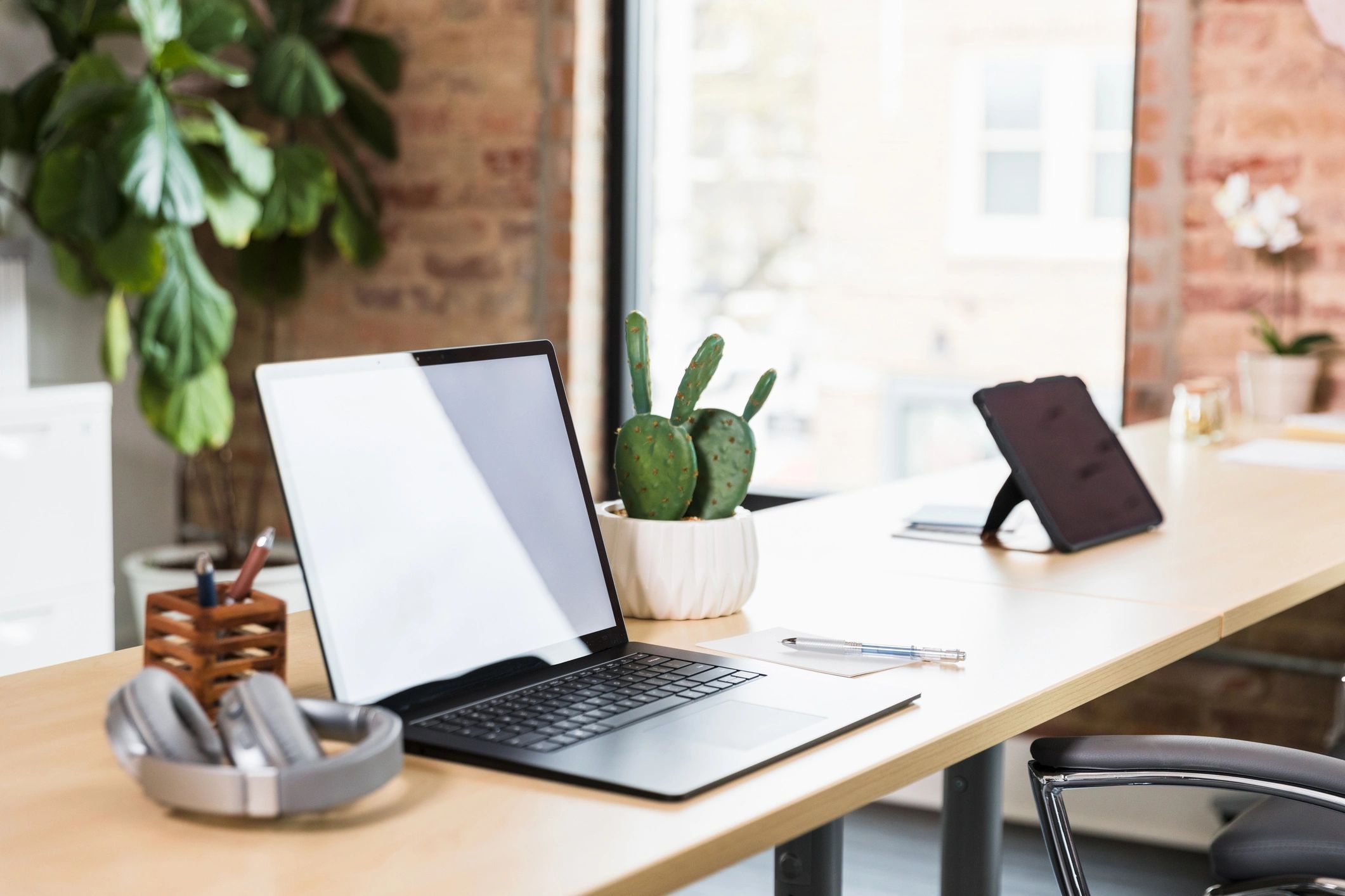Modern workspace with laptop and devices