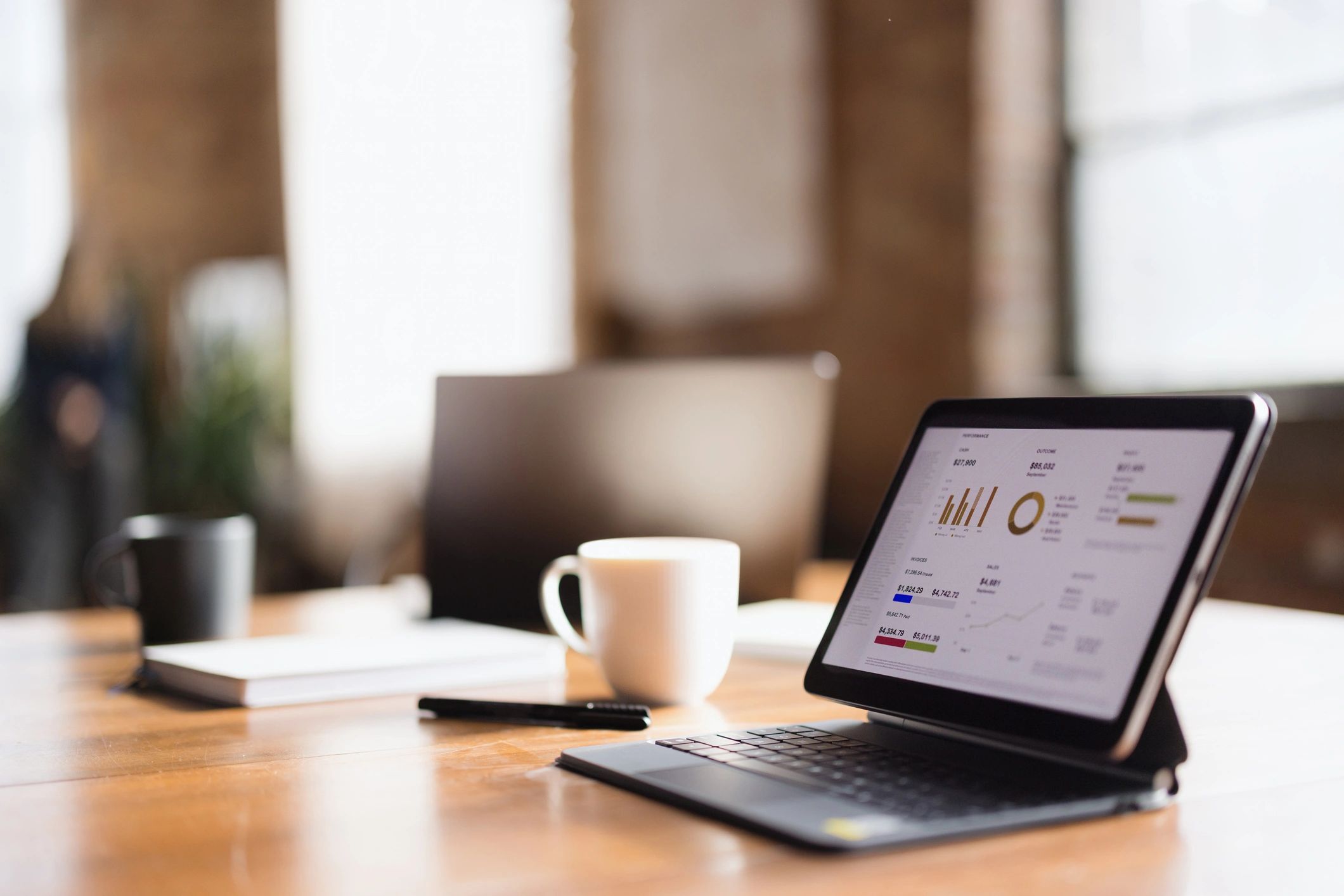 Business dashboard on a tablet representing monitoring and reporting